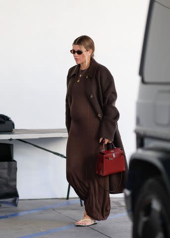 Sofia Richie Models a Chocolate-Brown Faux Leather Outfit From Her Bar III  Collaboration & White Boots