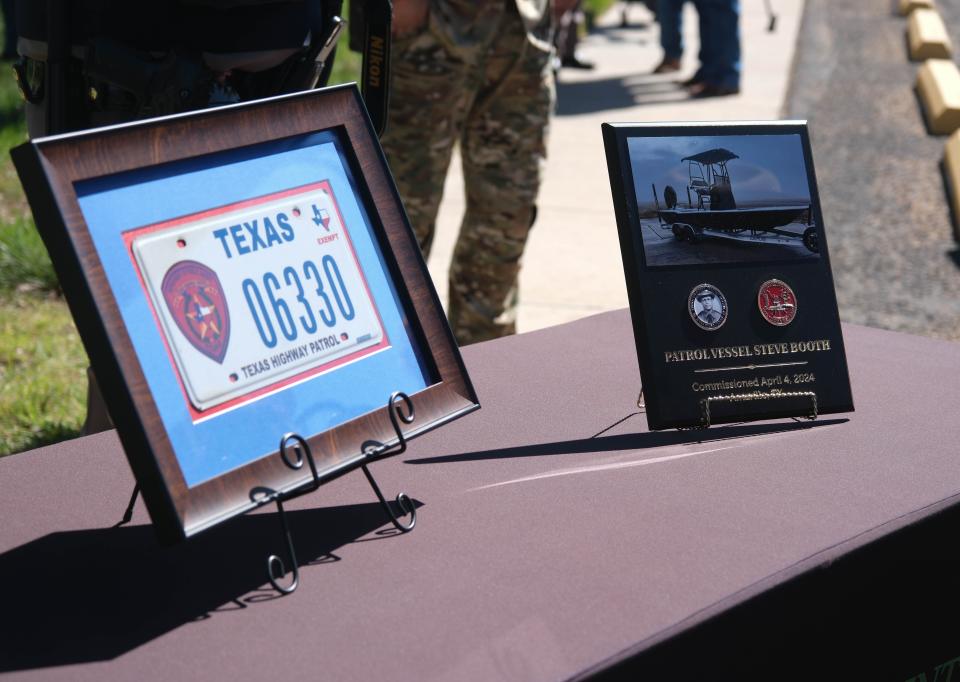 A plaque and plate for a boat named in honor of State Trooper Steve Booth at the Texas Panhandle War Memorial Center in Amarillo.