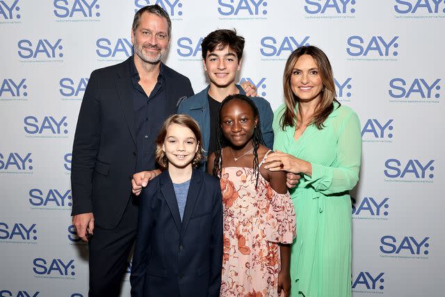 <p>Jamie McCarthy/Getty Images</p> Mariska Hargitay, Peter Hermann and their three kids