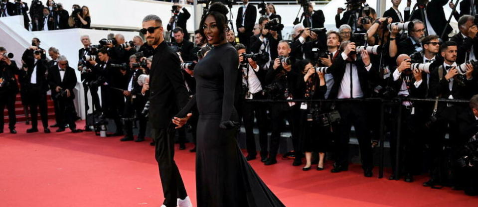 Aya Nakamura et son désormais ex-compagnon Vladimir Boudnikoff sur les marches du palais des Festivals à Cannes.  - Credit:PATRICIA DE MELO MOREIRA / AFP