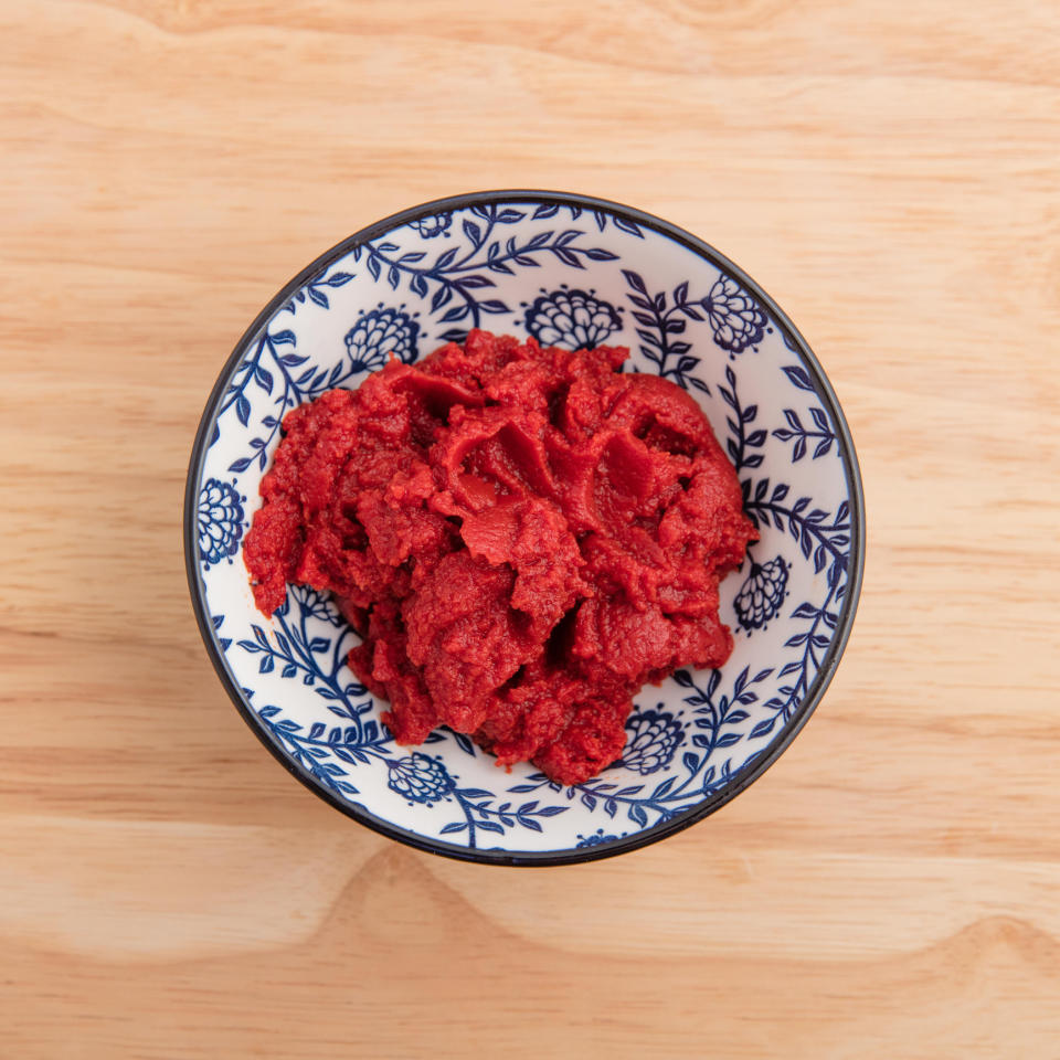 A bowl of tomato paste.