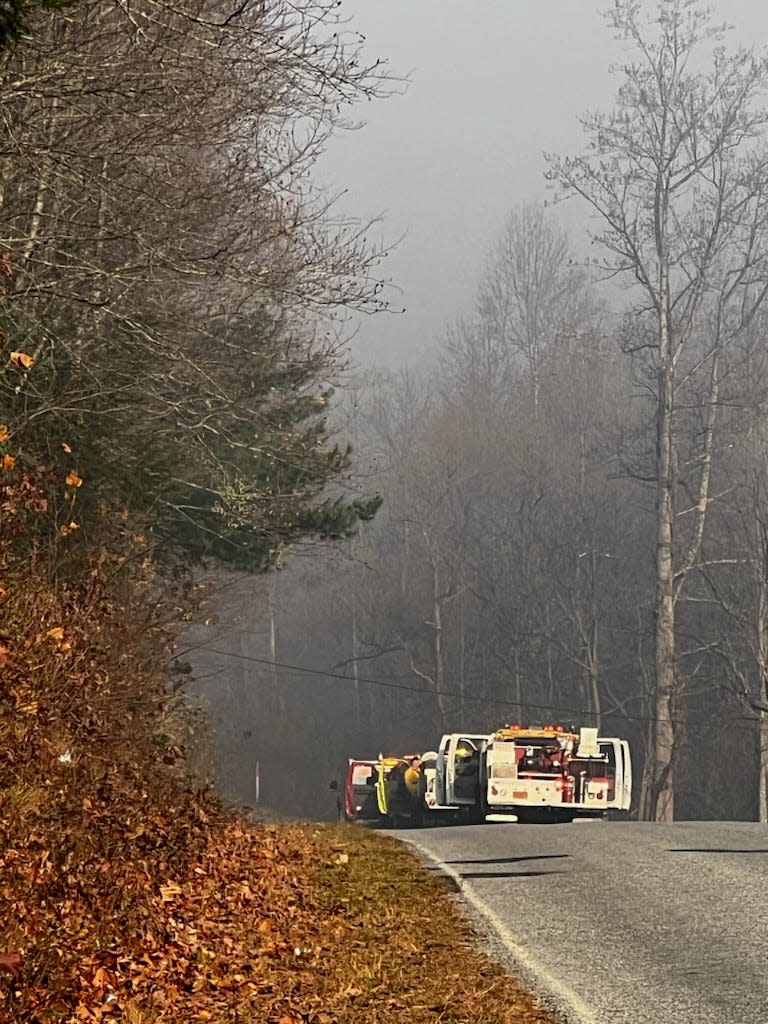 Emergency crews seen heading toward the Poplar Drive Fire near Stone Ashe Vineyards in Hendersonville. Tina Little, co-owner of the business, photographs the fire response vehicles at 8:40 a.m. Nov. 6, 2023.