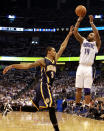 ORLANDO, FL - MAY 02: Guard Jameer Nelson #14 of the Orlando Magic shoots against Guard George Hill #3 of the Indiana Pacers in Game Three of the Eastern Conference Quarterfinals in the 2012 NBA Playoffs at Amway Center on May 2, 2012 in Orlando, Florida. NOTE TO USER: User expressly acknowledges and agrees that, by downloading and or using this photograph, User is consenting to the terms and conditions of the Getty Images License Agreement. (Photo by Marc Serota/Getty Images)