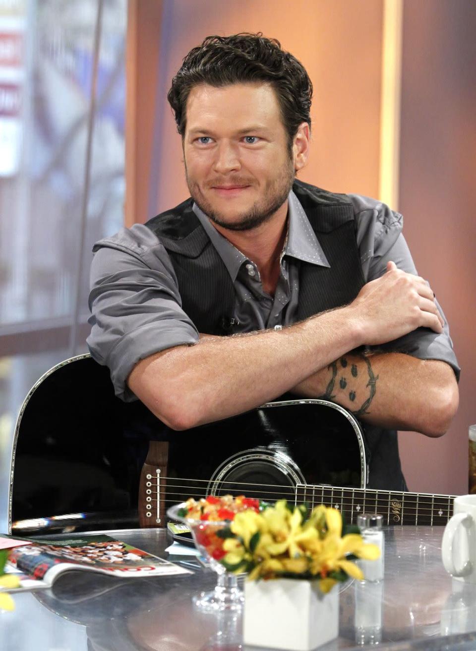 <p>One of Blake Shelton's tattoos is barbed wire around deer tracks. In an interview, he <a href="https://www.cheatsheet.com/entertainment/blake-shelton-said-he-has-the-crappiest-tattoo-and-fans-get-it-wrong.html/" rel="nofollow noopener" target="_blank" data-ylk="slk:explained" class="link rapid-noclick-resp">explained</a>, "This is what I drew him for a deer track. To this moment, people still come up to me and say, 'Man, ladybugs … that’s cool. What does that mean to you?' I probably have the crappiest tattoo - not only in country music - but maybe the world." </p>
