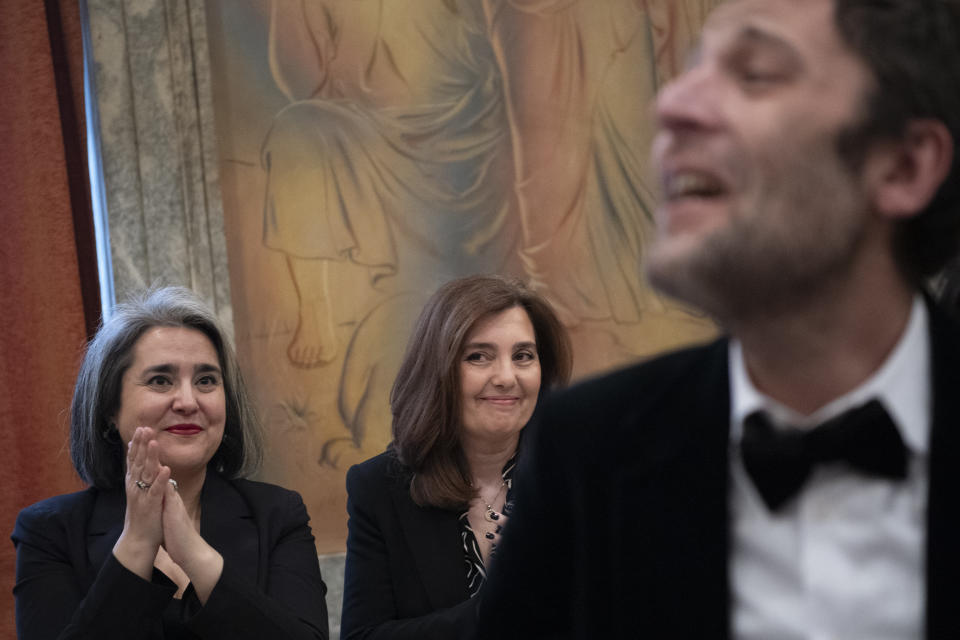 Guests react after the wedding of Greek author Petros Hadjopoulos, who uses the pen name Auguste Corteau, and lawyer Anastasios Samouilidis, at Athens City Hall, Greece, on Thursday, March 7, 2024. A Greek novelist and his partner on Thursday became the first male couple to be married in Athens' city hall following the legalization of same-sex marriage in Orthodox Christian Greece. (AP Photo/Michael Varaklas)