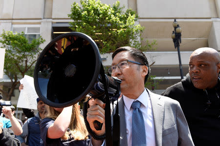 Gordon Mar, District 4 Supervisor, speaks out against high-profile tech companies during a strike against Uber’s recent 25 percent wage cut outside Uber's head office in San Francisco, California, U.S., May 8, 2019. REUTERS/Kate Munsch