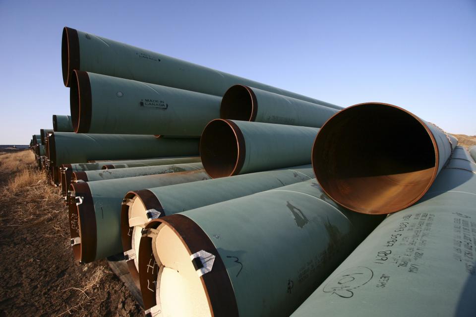 Pipes for underground fuel transport for TransCanada Corp.�s Keystone XL pipeline lie in a field in Gascoyne, North Dakota April 23, 2013. A U.S. State Department study on the environmental impact of the Keystone XL oil pipeline will not represent a final decision on whether the United States will allow the project to go forward, White House spokesman Jay Carney said on Friday. Picture taken April 23, 2013. REUTERS/Nathan VanderKlippe/The Globe and Mail (UNITED STATES - Tags: POLITICS ENERGY) NO SALES. NO ARCHIVES. FOR EDITORIAL USE ONLY. NOT FOR SALE FOR MARKETING OR ADVERTISING CAMPAIGNS. CANADA OUT. NO COMMERCIAL OR EDITORIAL SALES IN CANADA