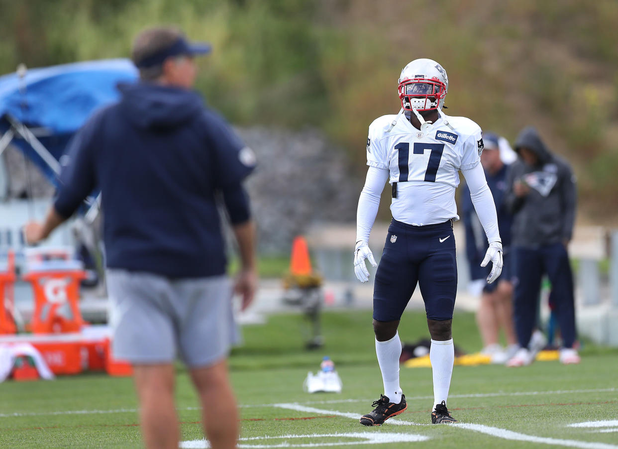 New England Patriots head coach Bill Belichick, left, wanted no part of questions regarding wide receiver Antonio Brown on Friday. (Getty Images)