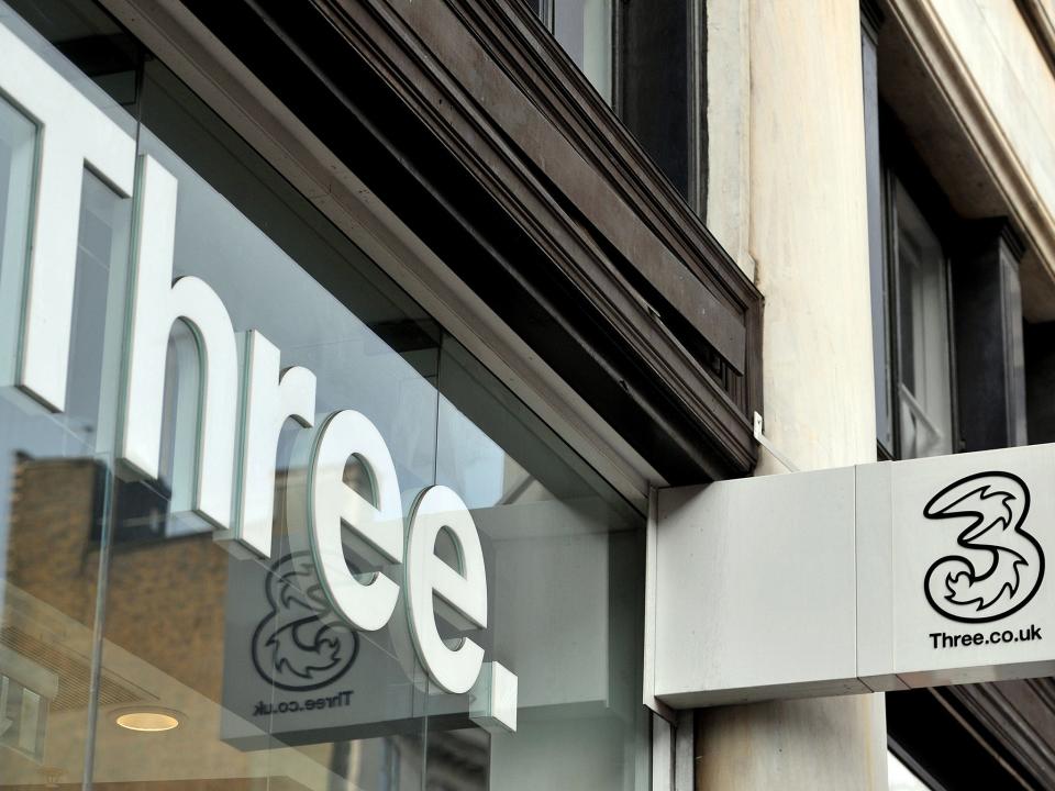 A shop sign for Three mobile in central London: PA