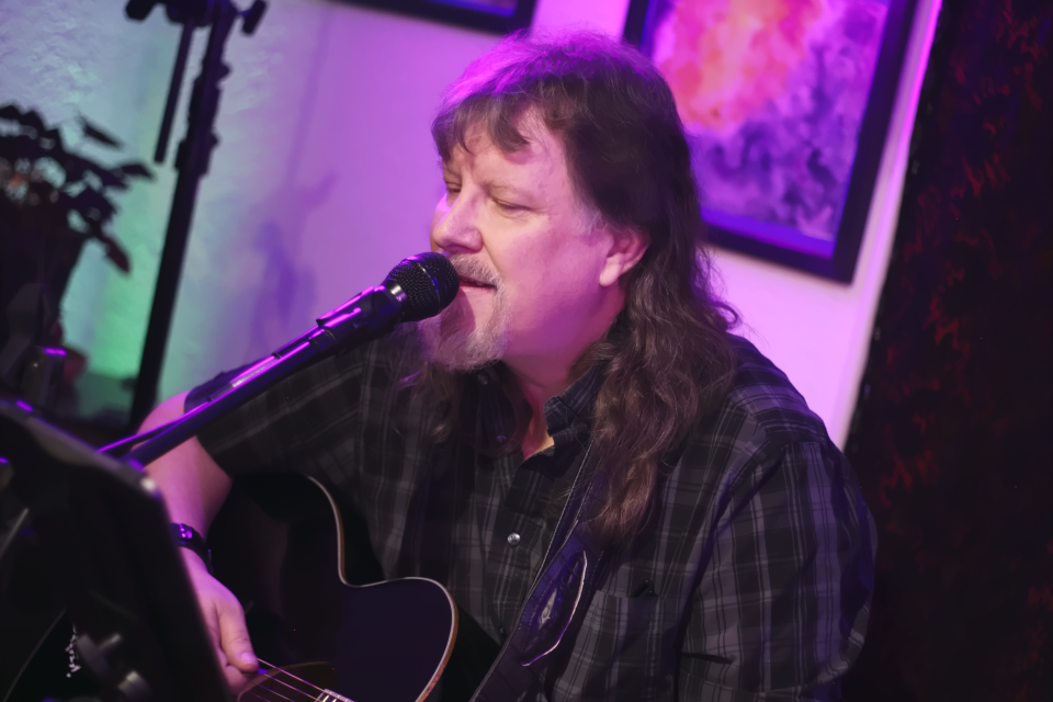 Las Cruces musician and songwriter Randy Lynch performs at the area’s first-ever Grief Party, a show that took place in late February 2024 to help people cope with its namesake emotion. Lynch says he experienced depression in the aftermath of a divorce, and writing and performing songs has been part of his healing journey.