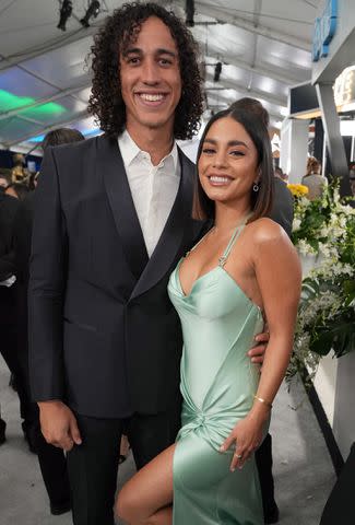 <p>Kevin Mazur/Getty Images</p> Cole Tucker and Vanessa Hudgens