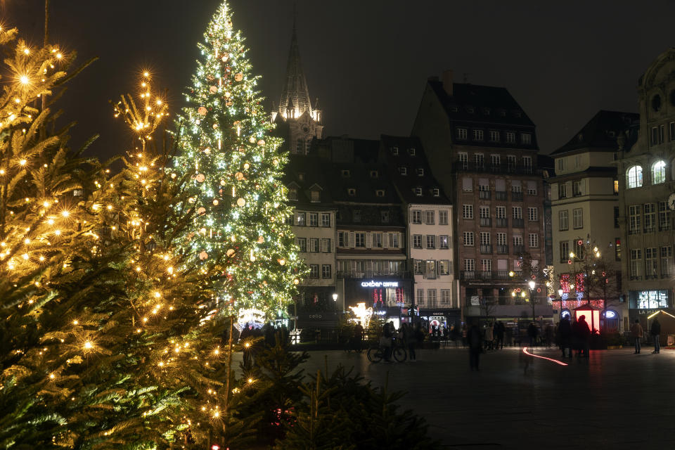 Christmas lightings are pictured where the Christmas market usually takes place, Friday, Nov.27, 2020 in Strasbourg, eastern France. Due to the COVID-19 pandemic, the well-known festive market will not be taking place this year. (AP Photo/Jean-Francois Badias)