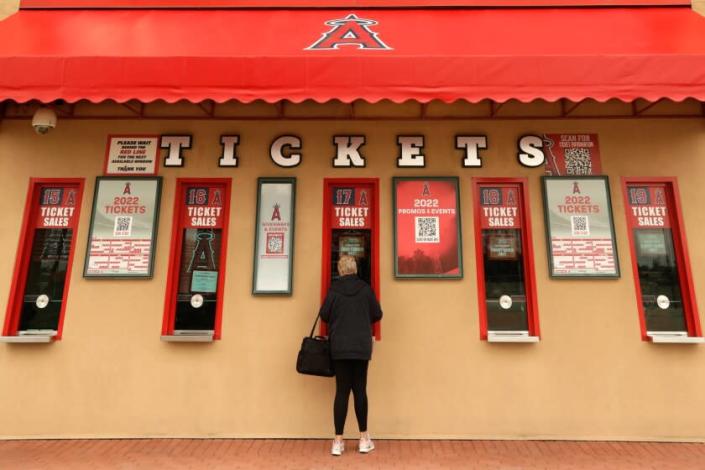 A fan buys tickets at the main entrance to Angel Stadium in Anaheim on May 23, 2022.