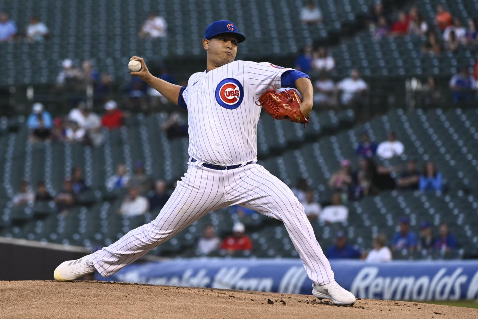 Chicago Cubs starting pitcher Javier Assad throws to a Cincinnati Reds batter during the first inning of a baseball game Wednesday, Sept. 7, 2022, in Chicago. (AP Photo/Matt Marton)