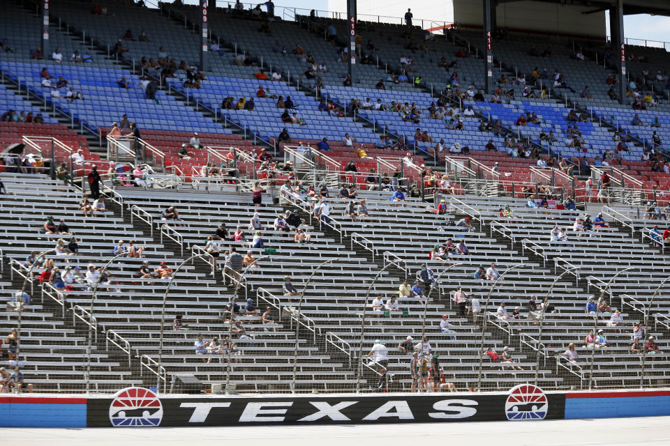 The grandstand is viewed at Texas Motor Speedway during a NASCAR Cup Series auto race in Fort Worth, Texas, Sunday, July 19, 2020. (AP Photo/Ray Carlin)