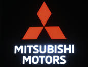 In this Oct. 25, 2017, photo, Mitsubishi Motor Co. logo is displayed at the Tokyo Auto show in Tokyo. German-U.S. automaker Daimler Chrysler bought a 37 percent stake in Tokyo-based Mitsubishi Motors Corp. in 2000, but the alliance felt rocky from the start. Mitsubishi Motors was embroiled in a years-long scandal over its systematic cover-up of auto defects. (AP Photo/Koji Sasahara)