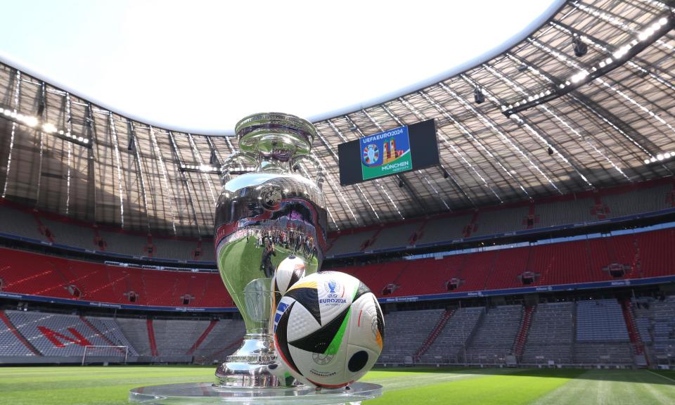 <span>The European Championship trophy takes centre stage in Munich’s Allianz Arena, stage for Friday’s opener, <a class="link " href="https://sports.yahoo.com/soccer/teams/germany/" data-i13n="sec:content-canvas;subsec:anchor_text;elm:context_link" data-ylk="slk:Germany;sec:content-canvas;subsec:anchor_text;elm:context_link;itc:0">Germany</a> v Scotland.</span><span>Photograph: Alexander Hassenstein/Uefa/Getty Images</span>