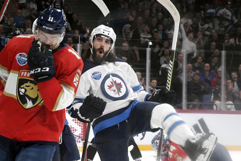 Mathieu Perreault (R) of Winnipeg Jets celebrates after scoring his team's opening goal during the ice hockey NHL Global Series match Florida Panthers vs Winnipeg Jets in Helsinki, Finland on Thursday, November 1, 2018. (Martti Kainulainen/Lehtikuva via AP)