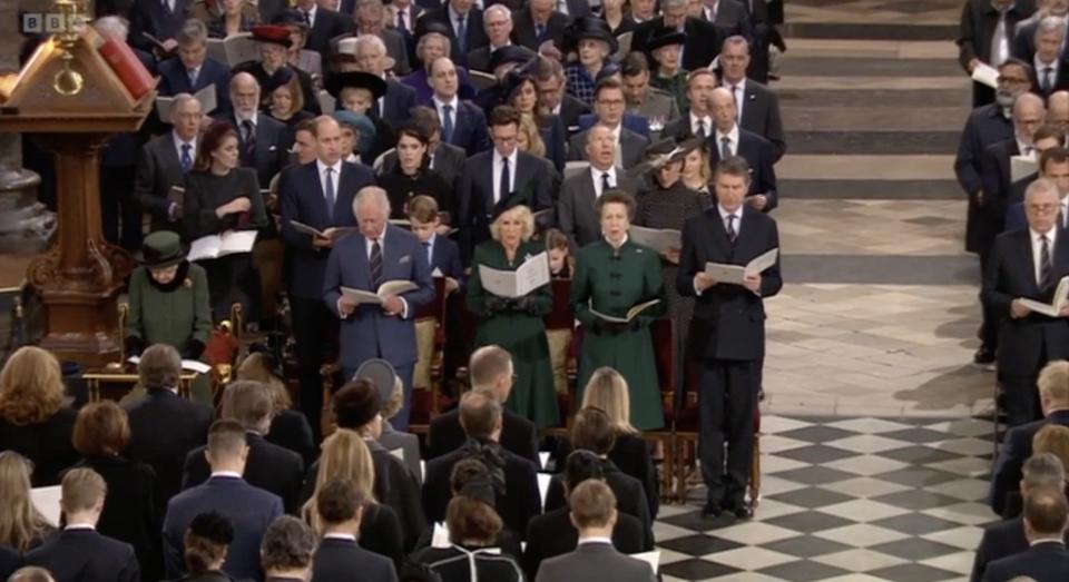 The Queen was seated to the left and Prince Andrew was seated to the right, next to Prince Andrew.