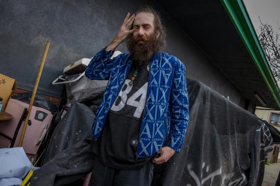 Sheridan Maki stands outside a homeless encampment on Franklin Avenue east of Cahuenga Boulevard.