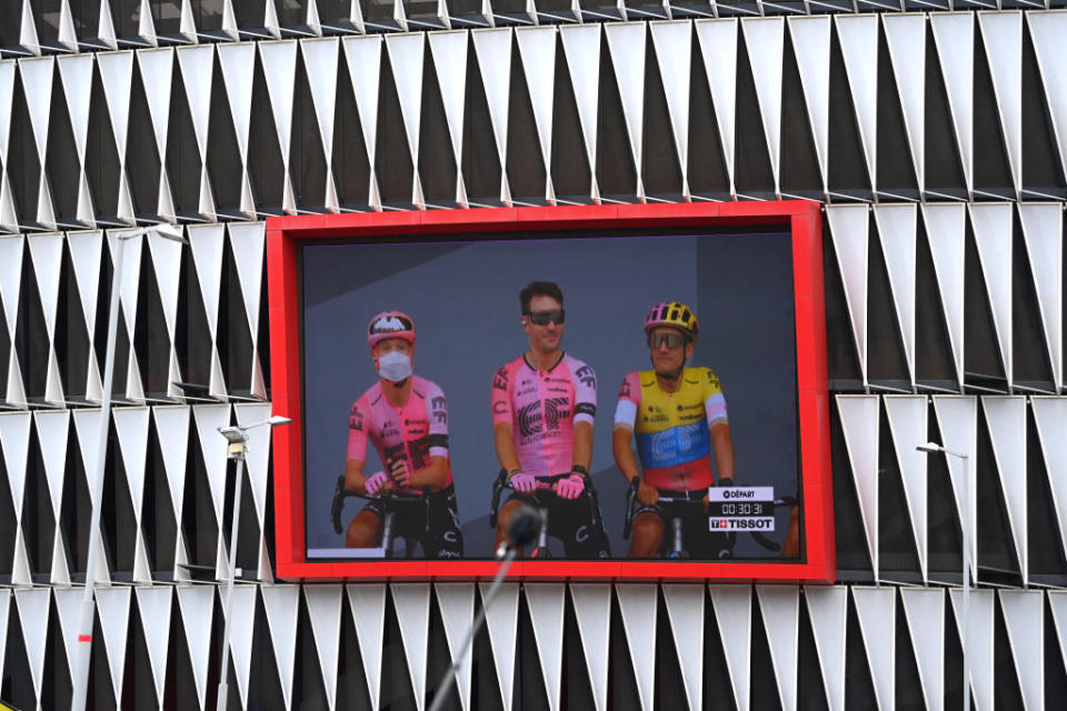 BILBAO SPAIN  JULY 01 A screen shows LR Magnus Cort of Denmark Alberto Bettiol of Italy and Richard Carapaz of Ecuador and Team EF EducationEasyPost to prior to the stage one of the 110th Tour de France 2023 a 182km stage from Bilbao to Bilbao  UCIWT  on July 01 2023 in Bilbao Spain Photo by Tim de WaeleGetty Images