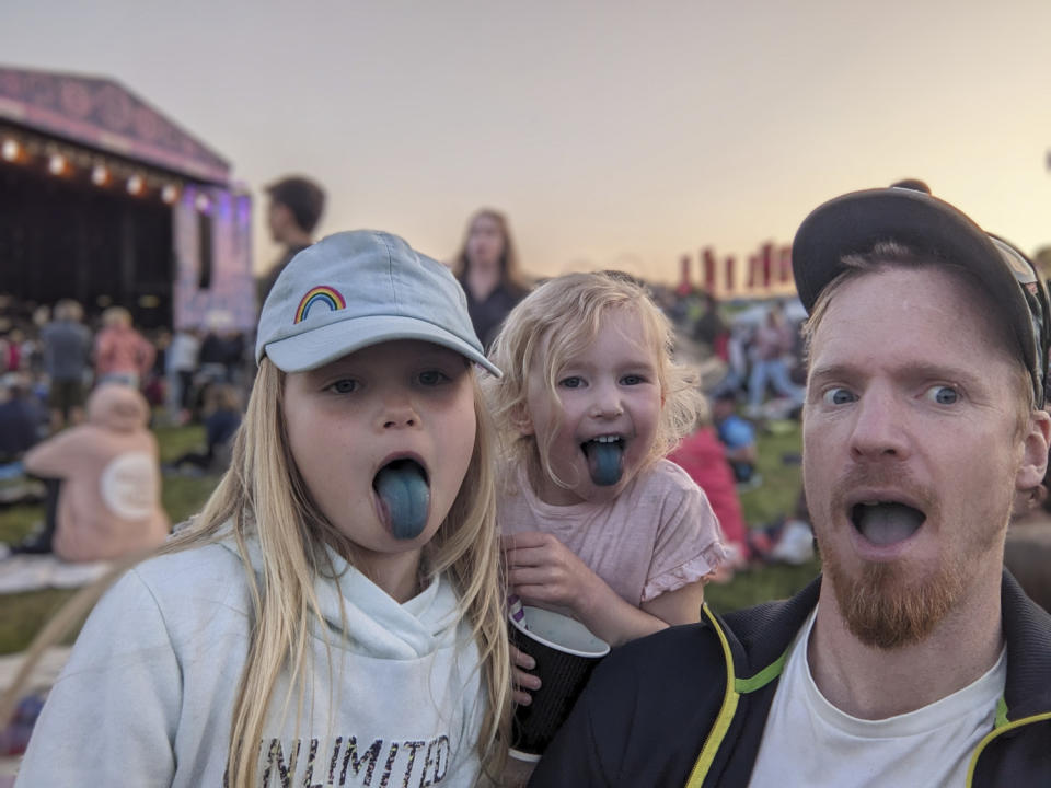 Family portrait at festival with all Google photo blur applied