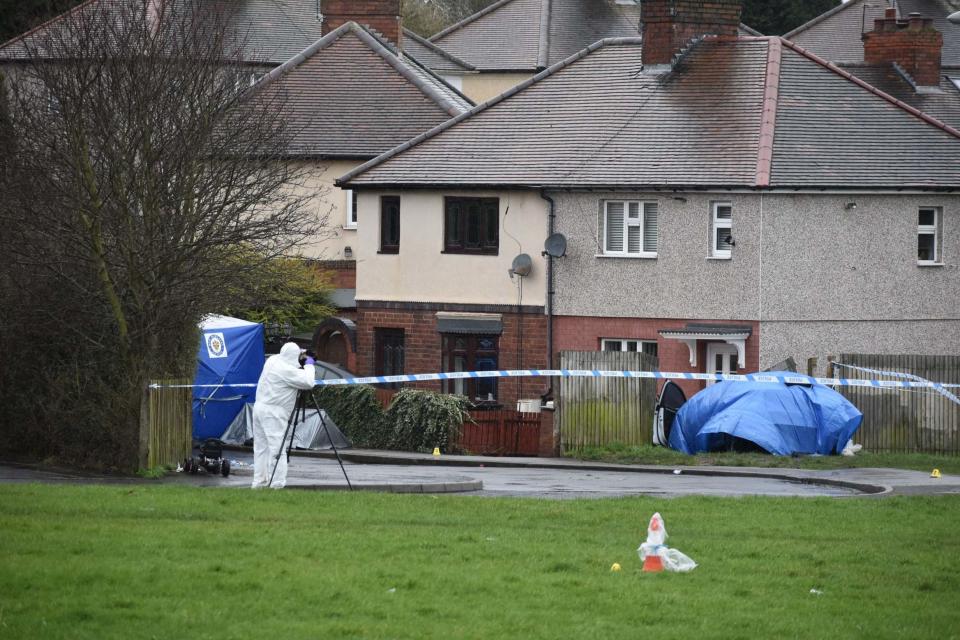 Police were called to reports of men trying to force entry to a home (PA)