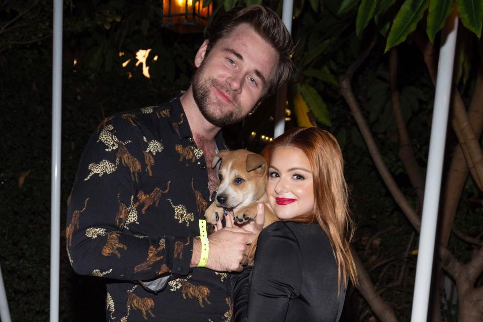 LOS ANGELES, CALIFORNIA - NOVEMBER 06: Actress Ariel Winter and actor Luke Benward meet &quot;Cupid&quot; the dog at the Wags &amp; Walks 10th Annual Gala at the Taglyan Complex on November 06, 2021 in Los Angeles, California. (Photo by Amanda Edwards/Getty Images)