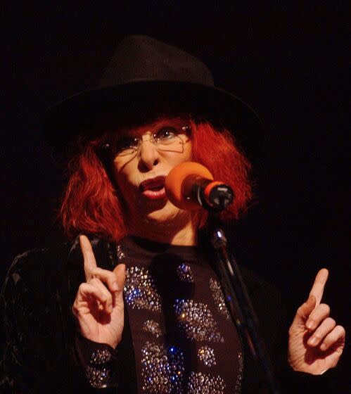 FILE - Brazilian singer Rita Lee performs in concert in Buenos Aires, Argentina, Nov. 23, 2002. Brazil's million-selling "Queen of Rock" who gained an international following through her colorful and candid style has died at the age 75 on the evening of May8, 2023, according to a statement posted to her official Instagram account. (AP Photo/Natacha Pisarenko, File)