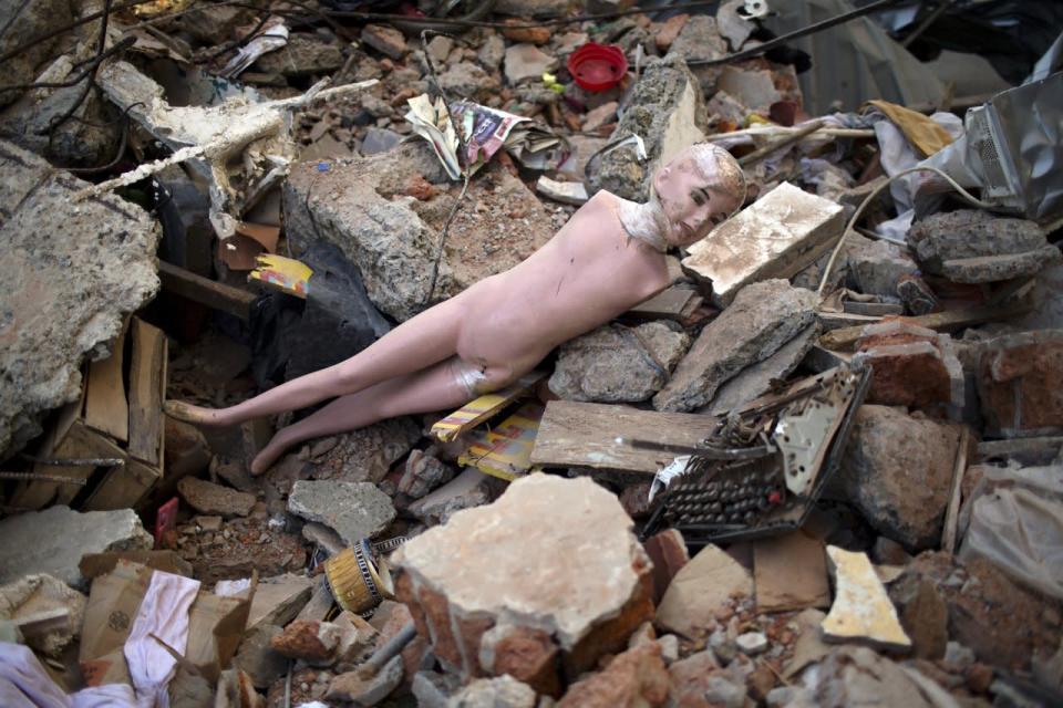 A mannequin amid the rubble