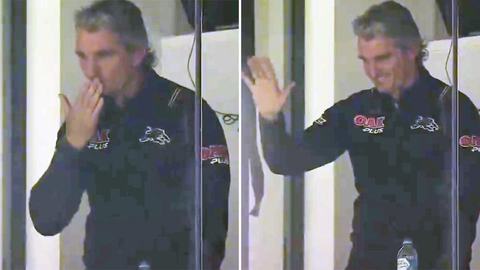 Ivan Cleary, pictured here blowing kisses and waving towards Wests Tigers fans.