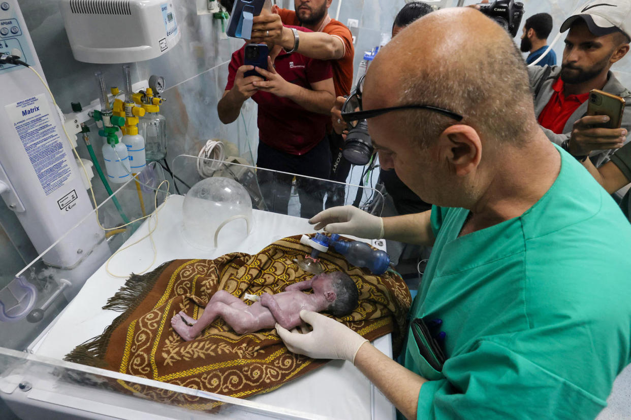 A Palestinian doctor tends to Sabreen Jouda, who was delivered prematurely after her mother was killed in an Israeli strike, at the Kuwait Hospital in Rafah, on the southern Gaza Strip on April 20, 2024. (Mohammed Abed / AFP via Getty Images)