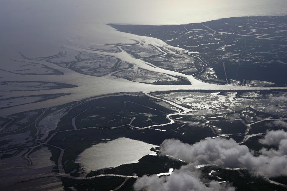 The Wax Lake Delta in the Atchafalaya Basin is seen from 8,500 feet in St. Mary Parish, La., Tuesday, May 25, 2021. In geological time, young means thousands of years. On that scale, Louisiana's Wax Lake Delta is taking its first breaths. (AP Photo/Gerald Herbert)