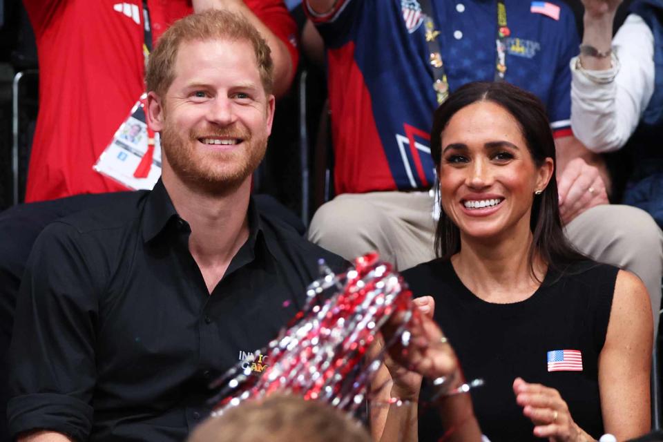 <p>Chris Jackson/Getty</p> Prince Harry and Meghan Markle at the Invictus Games in Germany on Sept. 13, 2023