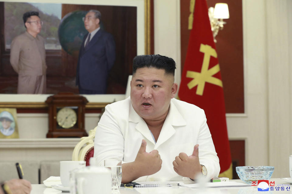 In this photo provided by the North Korean government, North Korean leader Kim Jong Un, presides over an executive policy council meeting at the ruling Workers’ Party in Pyongyang, North Korea, Wednesday, Aug. 5, 2020. Kim Jong Un directed his government agencies to act immediately to stabilize the livelihoods of residents in a city locked down over coronavirus concerns, state media reported Thursday, Aug. 6, 2020. Independent journalists were not given access to cover the event depicted in this image distributed by the North Korean government. The content of this image is as provided and cannot be independently verified. Korean language watermark on image as provided by source reads: "KCNA" which is the abbreviation for Korean Central News Agency. (Korean Central News Agency/Korea News Service via AP)