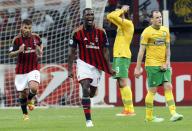 AC Milan's Cristian Zapata celebrates after scoring against Celtic during their Champions League Group H soccer match at San Siro stadium in Milan September 18, 2013. REUTERS/Alessandro Garofalo (ITALY - Tags: SPORT SOCCER)