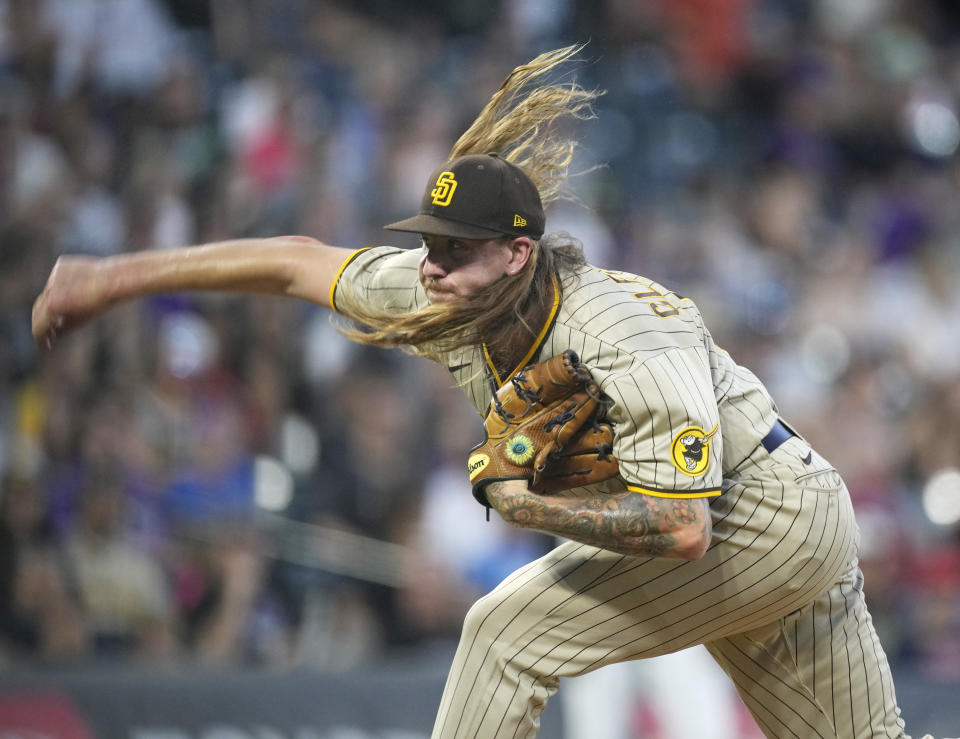 San Diego Padres relief pitcher Mike Clevinger works in the fifth inning of a baseball game against the Colorado Rockies, Friday, June 17, 2022, in Denver. (AP Photo/David Zalubowski)