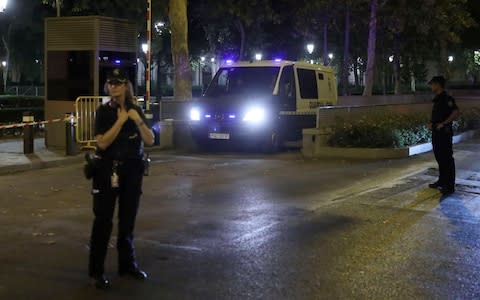 A Civil Guard van leaves the National Court with Jordi Sanchez and Jordi Cuixart on board on Monday - Credit: KIKO HUESCA/EPA