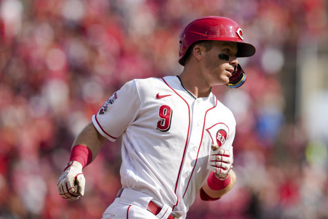 Cincinnati Reds left fielder Stuart Fairchild enters the field