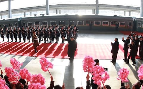 North Korean leader Kim Jong Un (C) departing Pyongyang Station for the second North Korea-US summit meeting in Hanoi - Credit: AFP