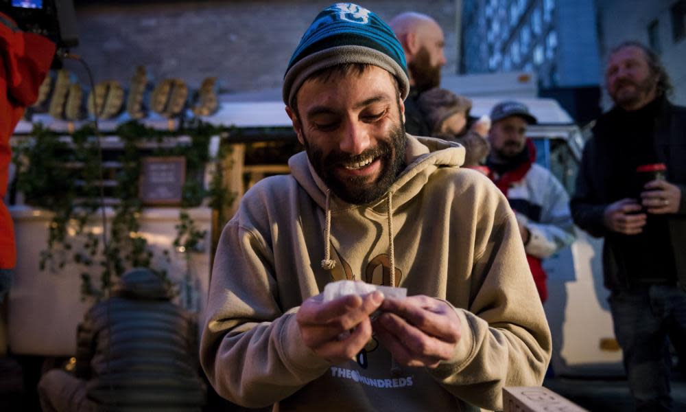 A man rolls a joint during a ‘Wake and Bake’ legalised marijuana event in Toronto. 
