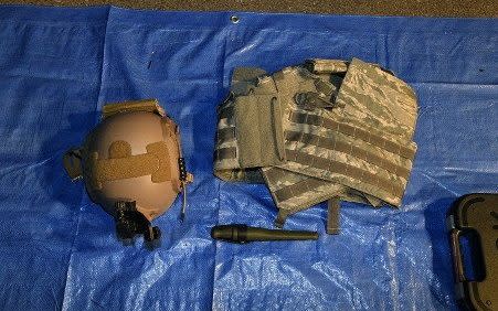 Army helmet and flak jacket - Department of Justice/Reuters