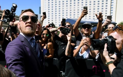 UFC lightweight champion Conor McGregor arrives at Toshiba Plaza  - Credit: Getty