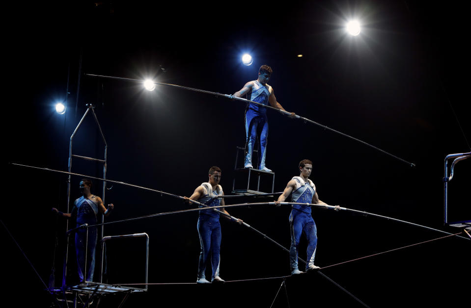 A Ringling Bros. and Barnum & Bailey high wire act performs during a show Saturday, Jan. 14, 2017, in Orlando, Fla. The Ringling Bros. and Barnum & Bailey Circus will end the "The Greatest Show on Earth" in May, following a 146-year run of performances. Kenneth Feld, the chairman and CEO of Feld Entertainment, which owns the circus, told The Associated Press, declining attendance combined with high operating costs are among the reasons for closing. (AP Photo/Chris O'Meara)