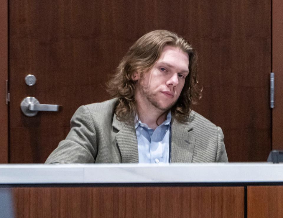 Nathanael Benton, reacts to a question during his trial at the Waukesha County Courthouse in June. Benton, 25, of North Dakota, was sentenced in the shootings of two police officers in Delafield in 2020.