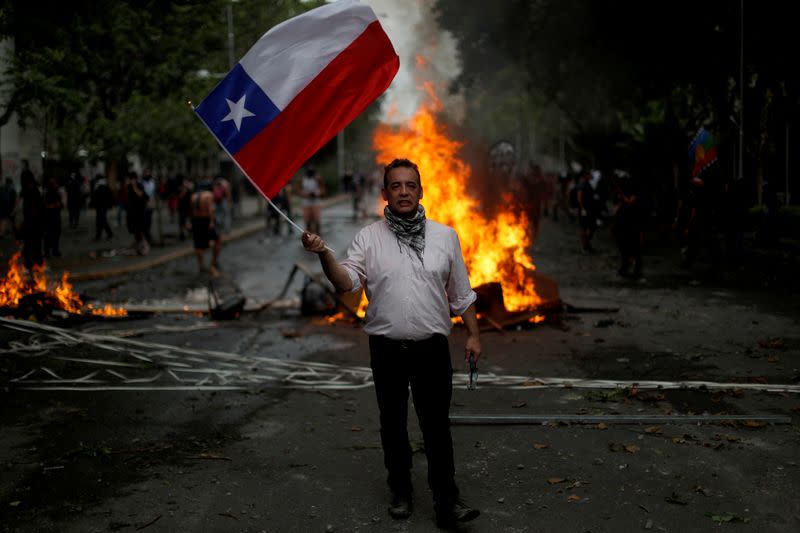 Wider Image: Portraits from the frontlines of global protests