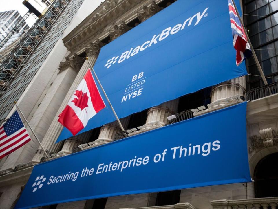  BlackBerry Ltd. signage is displayed in front of the New York Stock Exchange (NYSE) during the company’s listing migration to the NYSE in New York, on Oct. 16, 2017.