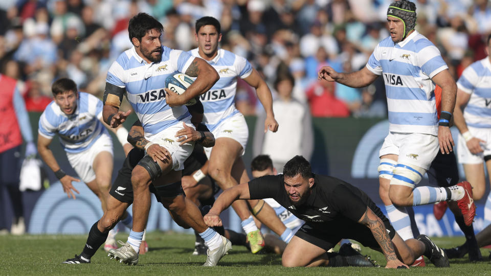 Argentina's Los Pumas Rodrigo Bruni is tackled by New Zealand's All Blacks Aaron Smith during a rugby championship match at Malvinas Argentinas stadium in Mendoza, Argentina, Saturday, July 8, 2023. (AP Photo/Nicolas Aguilera)