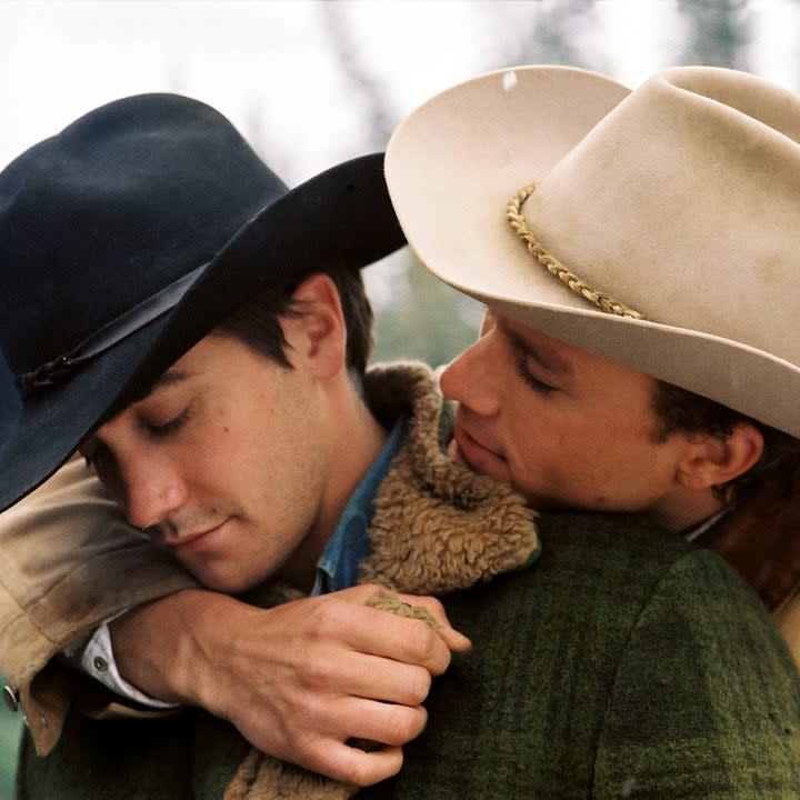 Two cowboys hugging in Brokeback Mountain