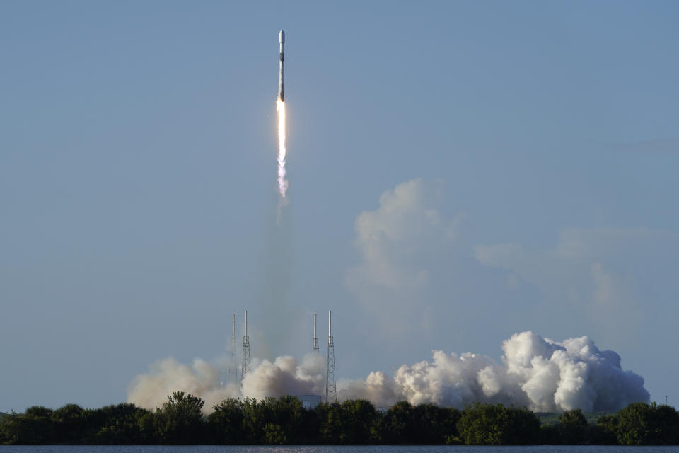 A SpaceX Falcon 9 rocket, with the Korea Pathfinder Lunar Orbiter, or KPLO, lifts off from launch complex 40 at the Cape Canaveral Space Force Station in Cape Canaveral, Fla., Thursday, Aug. 4, 2022. South Korea joined the stampede to the moon Thursday with the launch of a lunar orbiter that will scout out future landing spots. (AP Photo/John Raoux)